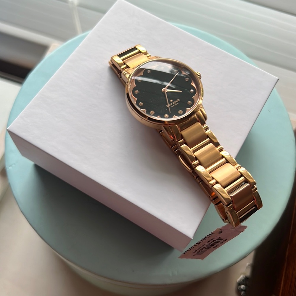 Kate spade watch nwt rose gold and black. Needs new battery